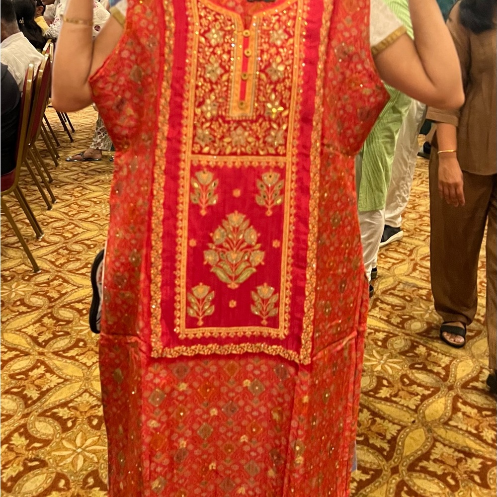 Carrot color kurta set with crystal/ mirror  work